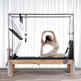 cadillac bed reformer with full trapeze attachment